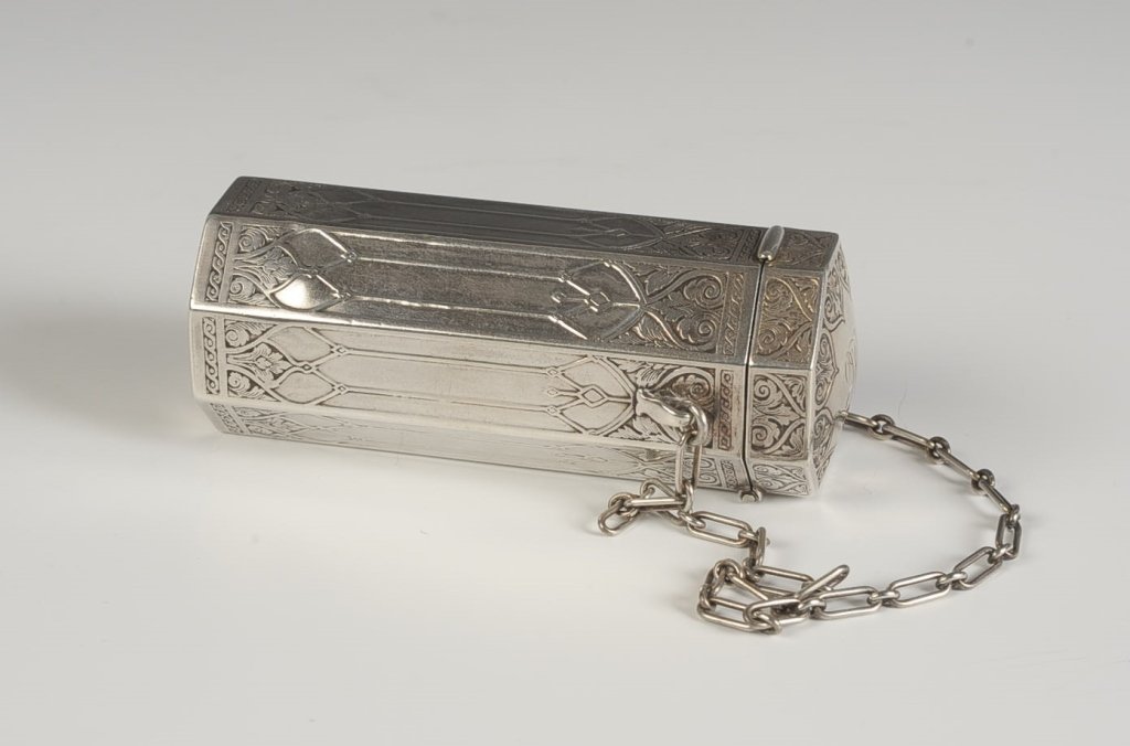 STERLING ART DECO NECESSAIRE WITH COMPACT TOP: William B. Kerr & Co. sterling necessaire with an embossed Art Deco design, monogrammed, chain handle, compact top with a mirrored lid and puff over a velvet lined purse compartment, marked on the pur