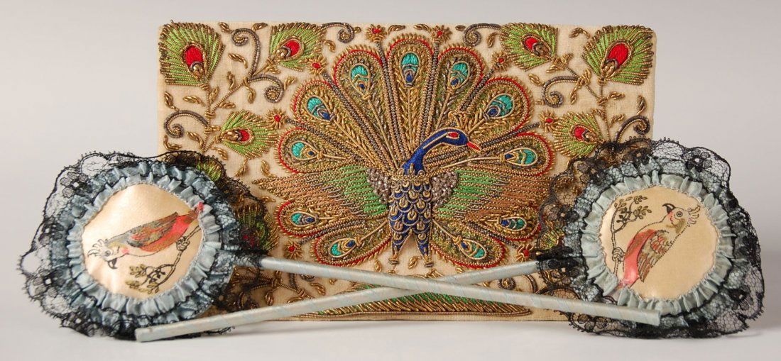 CLUTCH PURSE PEACOCK, PLUS FANCY MIRROR & PUFF SET: Velveteen clutch bag with an embroidered peacock on the front, satin lining, measures 5 x 8 inches. Plus a hand mirror and powder puff set with painted parrots, original paper label with poem present,