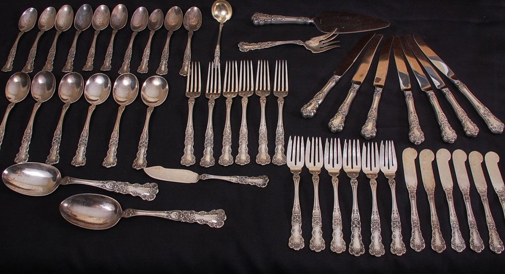 A 46-PIECE SERVICE OF GORHAM 'BUTTERCUP' STERLING: A flatware set consisting of six dinner or luncheon forks, seven dinner or luncheon knives, size salad forks, six butter spreaders flat, six cream soup spoons, ten tea spoons, two table spoons, master