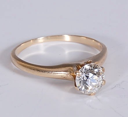 ANTIQUE 14K YELLOW GOLD SOLITARE WITH DIAMOND: Yellow gold solitaire set with European cut diamond. Ring size 5.5