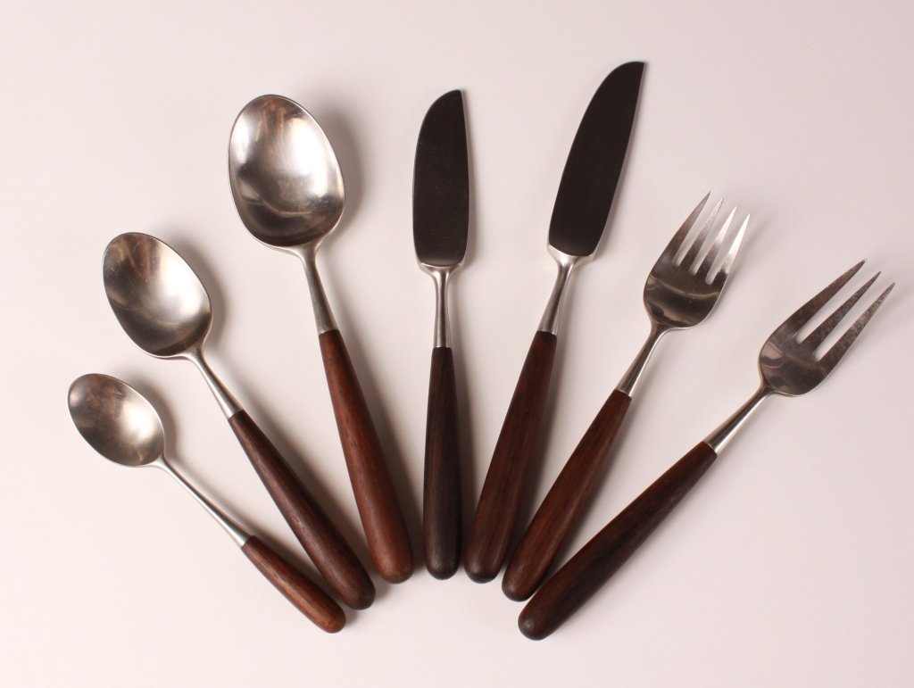 LAUFFER NORWAY 'PALISADES' STAINLESS ROSEWOOD FLATWARE: Scandinavian rosewood and stainless steel flatware set includes twelve knives measuring 8.5 inches, eight knives measuring 7.5 inches, nine very small spoons measuring 5.25 inches, twelve spoons that 