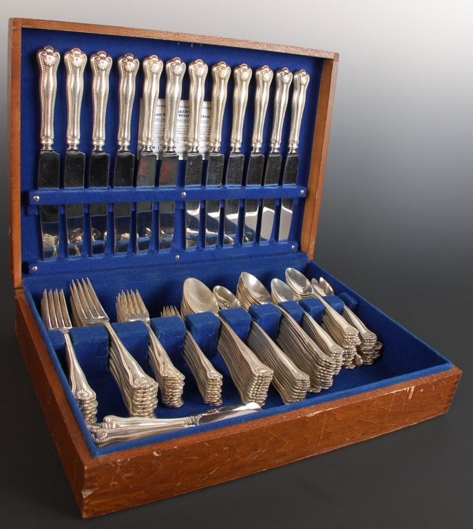 FRANK SMITH 'NEWPORT SHELL' STERLING SILVER FLATWARE: Flatware set includes twelve 5.5 inch ice cream forks, twenty-four 5.75 inch teaspoons, twelve 7 inch cream soup spoons, twelve 7.25 inch iced tea spoons, twelve 7 inch place spoons, thirteen 5.5 inch