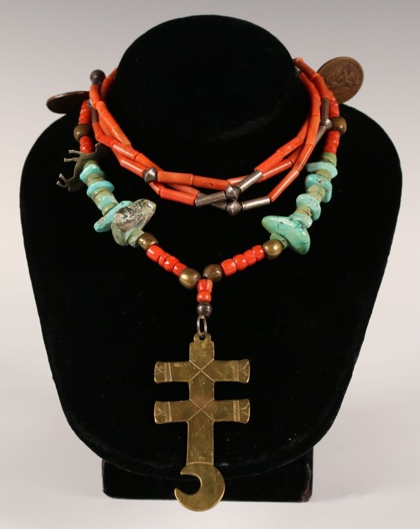 TURQUOISE AND CORAL JEWELRY: Mexican turquoise and coral beaded necklace with Mexican coins circa 1920s and a brass pendant, measures 28 inches. Plus a three strand coral necklace with silver accent beads, measures 26 inches.