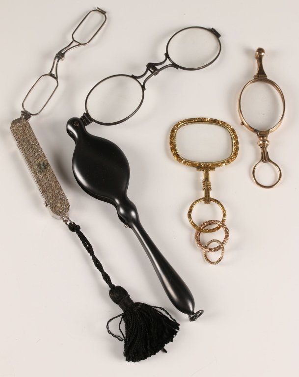 ANTIQUE LORGNETTE: Three pair of antique lorgnette including an Art Deco example set with rhinestones. Four pieces ranging in size from 5.5 inches in length, down to 3.5 inches in length.
