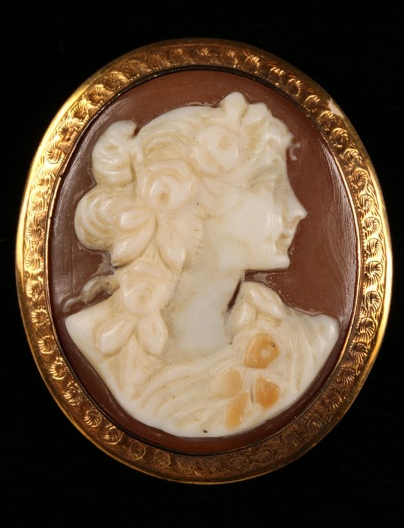 VICTORIAN CARVED SHELL CAMEO IN GOLD BEZEL: Pendant measures 1.5 inches in length.