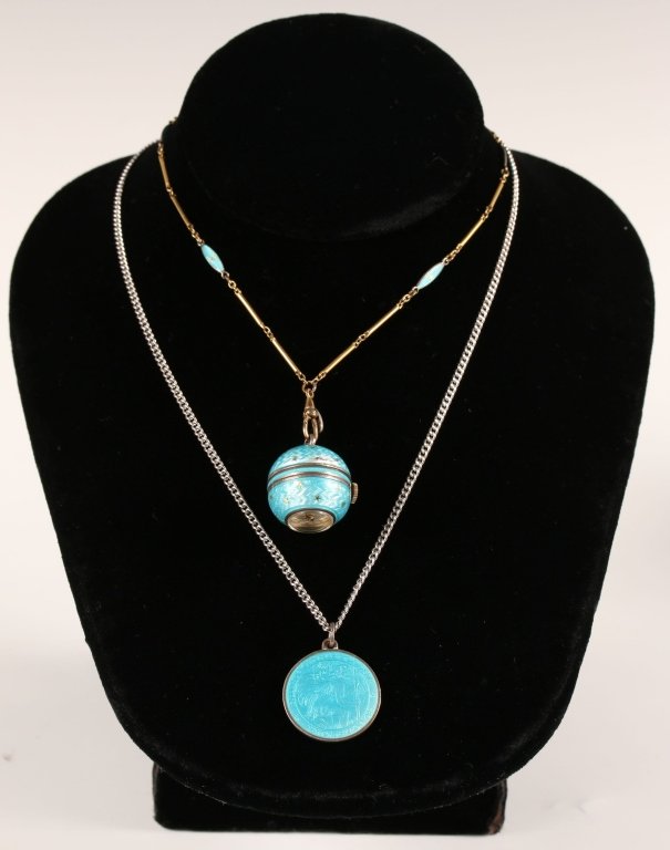 BUCHERER BLUE ENAMEL ART DECO BALL WATCH: Enameled ball shaped watch on a matching chain plus a similar blue enamel sterling silver pendant. Ball watch chain measures 28 inches in length, and the other measures 18 inches in length, also marke