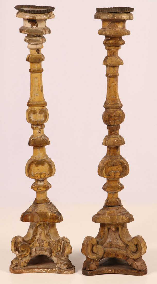 LARGE PAIR 18TH C. ALTAR STICKS 43 INCHES: An exceptionally large pair that measures 43 inches high. The original surface over gessoed wood, with gilt accents and cream-colored recessed portions.600 800 300