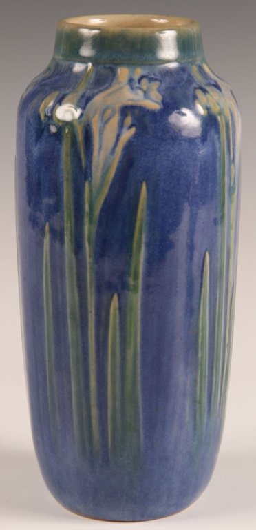 1927 NEWCOMB COLLEGE HIGH GLAZE ART POTTERY VASE: With a carved iris motif, high gloss glaze, dark buff clay unglazed base with stamped date mark QD3, faint Newcomb College mark on the base, illegible decorator's scribed mark could be interpreted as 
