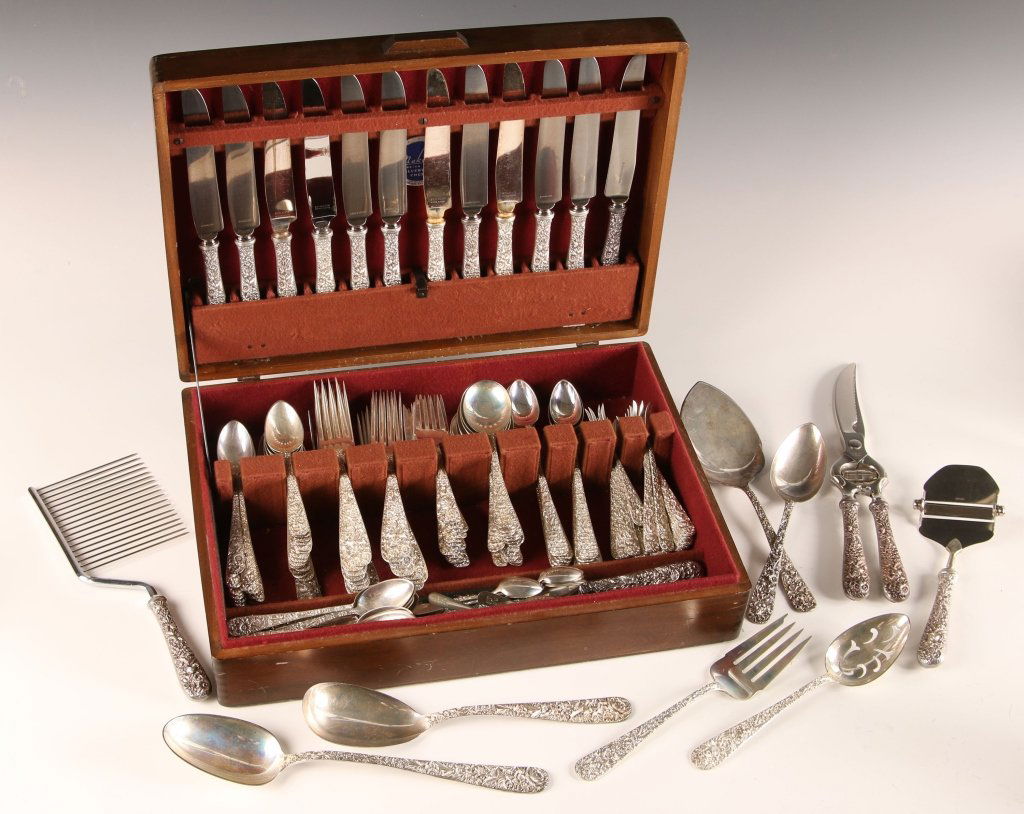 170 PIECE SET KIRK 'REPOUSSE' STERLING SILVER FLATWARE: Large and extensive service including: Sixteen 8 inch forks, seventeen 6 inch cream soup spoons, ten 5.75 inch tea or coffee spoons, eleven 6.25 inch grape fruit spoons, two 7.25 inch place spoons, on