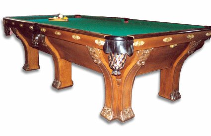 The Pfister 1895 Pool Table by Brunswick: The Pfister 1895 Pool Table by Brunswick Balke Collender. This nine foot, 1.5 inch slate top table is a six leg style in quarter sawn oak with carvings and overall design in an Art Nouveau stlye. Fair