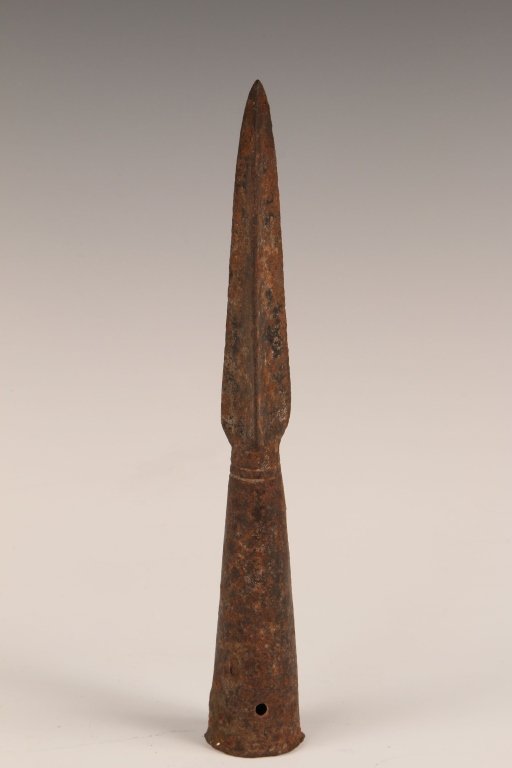 GREEK IRON SPEAR POINT, CIRCA 400 BC: Reportedly from Larrissa, Greece, discovered pre-1900. Believed to date back to 200 - 400 BC. Three symmentrical concave and converging faces, measures approximately 8.75 inches.