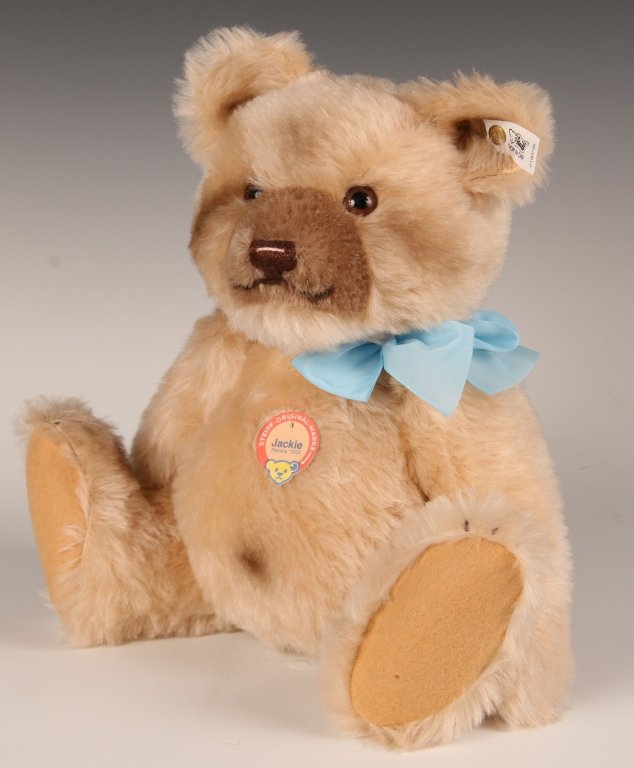 STEIFF REPLICA JACKIE BEAR LIMITED EDITION WITH BOX: 1988 replica of the 1953 edition, blond mohair, 0190/35, button in ear with white label, paper chest tag, limited edition of 4000, measures 13 inches (33 cm) standing.