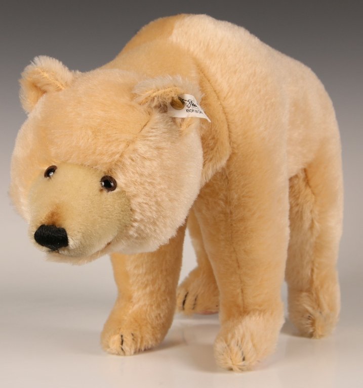 STEIFF MECHANICAL POLAR BEAR LIMITED EDITION W BOX: 1989 replica of the 1931 edition, polar bear standing on four legs, white mohair with tail mechanism that moves the head, button in ear with white label, 130/28, limited edition of 3000, measures 10.5
