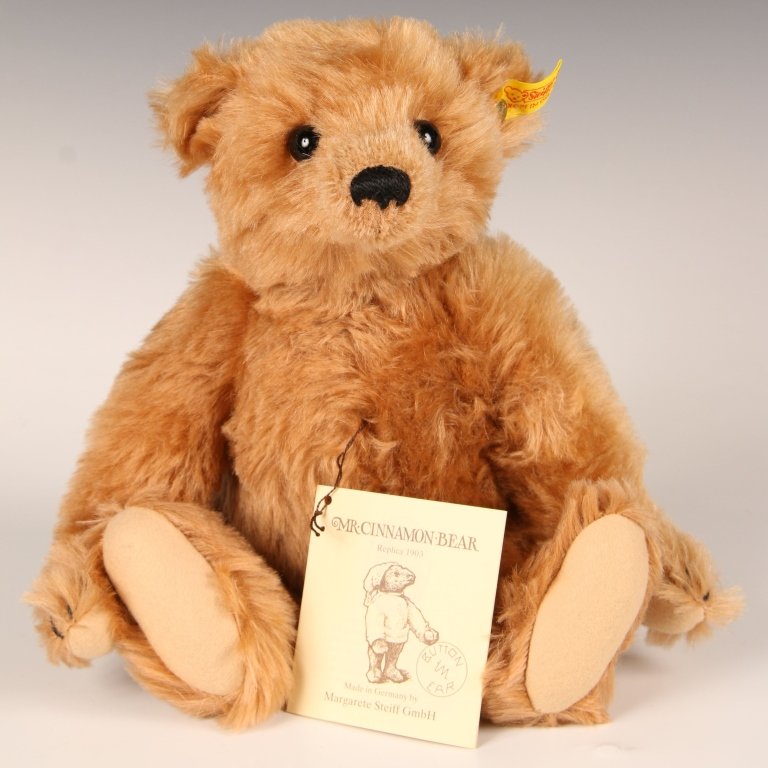 STEIFF MR. CINNAMON REPLICA TEDDY BEAR: 1984 replica of the 1903 edition, 0151/32, button in ear with yellow tag, paper hang tag, measures 12 inches (32 cm).