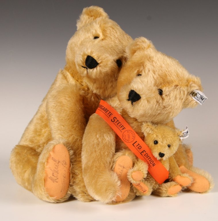 STEIFF THREE PIECE PAPA, MAMA & BABY BEARS, SIGNED: 1980-1981 bears with papa 0153/43 limited edition of 11,000, mama and baby 0155/38 limited edition of 8000, signed on the paw pads by Hans Otto Steiff and Birgit Steiff and dated 1980 and 1981, button