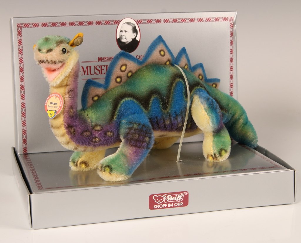 STEIFF MUSEUM COLLECTION DINOS LIMITED EDITION W BOX: 1990 replica of the 1959 historical piece, button in ear, paper chest tag, original numbered box, limited edition of 4000, Dinos measures 5 x 10 inches.