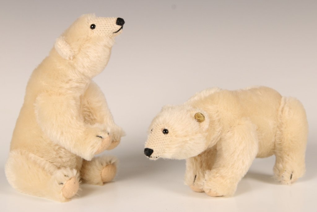 TWO STEIFF STANDING POLAR BEARS: Miniature standing jointed bears with button eyes, stitched noses, blonde fur, script buttons in ears, no labels, measure 3.5 x 7 inches each.
