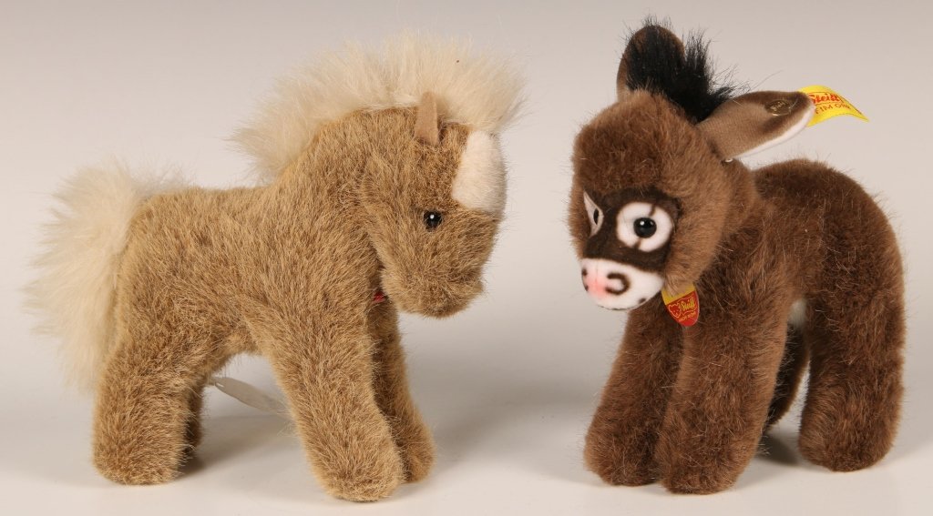 STEIFF ASSY DONKEY 1510/14 & STOMPY PONY 1516/14: Assy the Donkey with button eyes, brown fur, script button in ear, yellow label, paper chest tag, measures 6 inches, very good condition. Plus Stompy the Pony with light brown fur, missing it's button