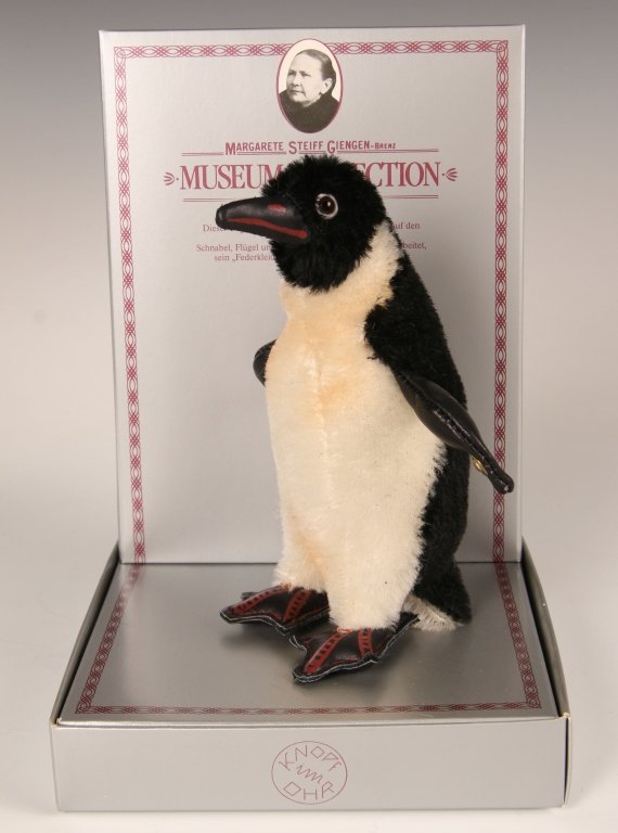 STEIFF MUSEUM COLLECTION PENGUIN LIMITED EDITION W BOX: 1984 replica of the 1928 historical piece, leather wings and feet, button on one wing, original numbered box, limited edition of 8000, measures 7 inches (18 cm).