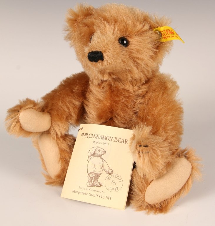STEIFF MR. CINNAMON REPLICA TEDDY BEAR: 1984 replica of the 1903 edition, button in ear with yellow label, 0151/25, paper hang tag, measures 9 inches (25 cm).