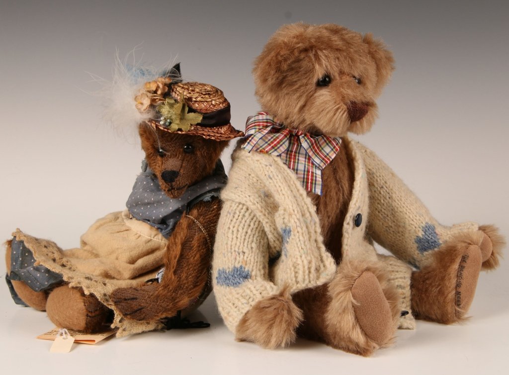 TWO ARTISAN TEDDY BEARS WITH CLOTHING: Almyra Button' dressed bear by Tammie Lawrence, measures 12 inches. Unsigned bear in a sweater measures 14 inches.