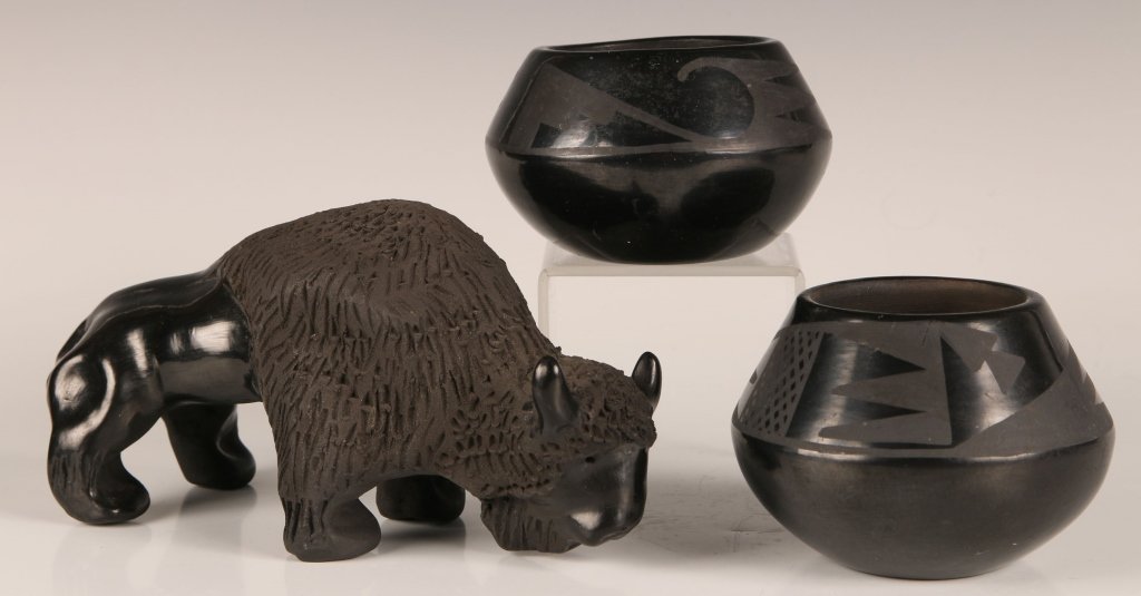 SANTA CLARA POTTERY INCLUDING BUFFALO FIGURE: A buffalo figure that measures 4 x 8 inches, along with two unsigned vases that measure approximately 3 x 4 inches.