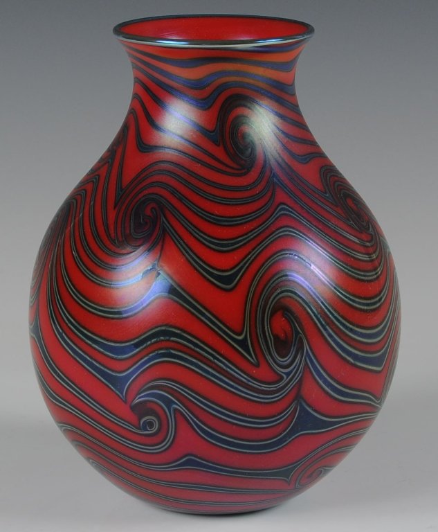 CHARLES LOTTON RED KING TUT VASE 1977: A scarce red King Tut vase with great patterning, signed Charles Lotton 1977. Measures 7.25 x 5 inches.