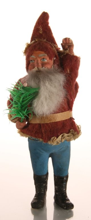 UNUSUAL WAVING SANTA GERMAN CANDY CONTAINER CIRCA 1900: Circa 1900 German papier mache' candy container, an unusual example of Santa Claus with hand up waving. Measures 7.5 x 3 inches.