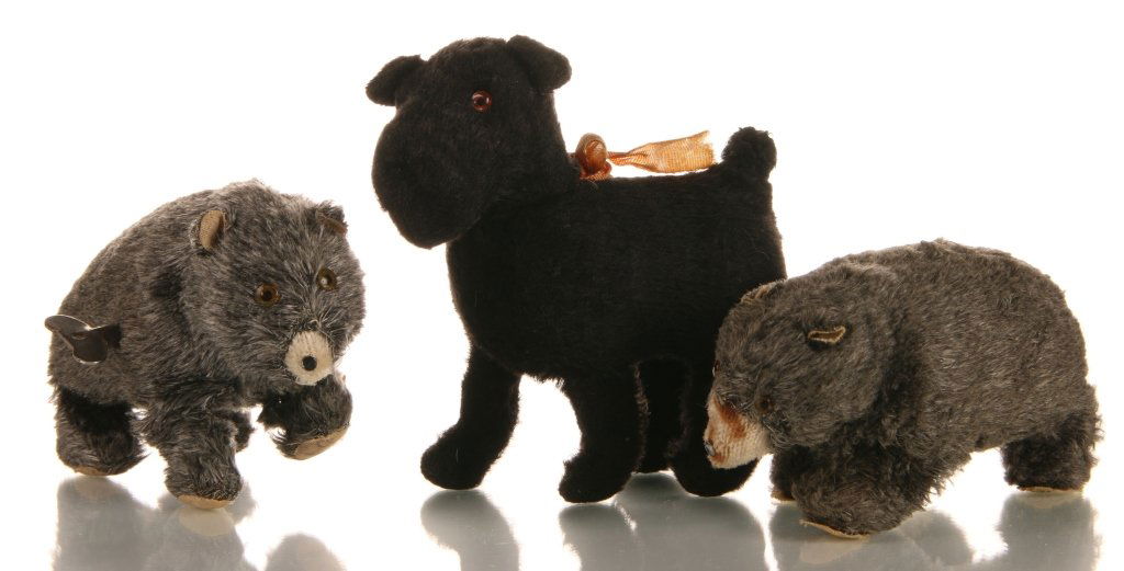 THREE WIND UP TOYS: Three pieces ranging in size from 5 x 5 x 2.5 inches, down to 3 x 5 x 2.5 inches.