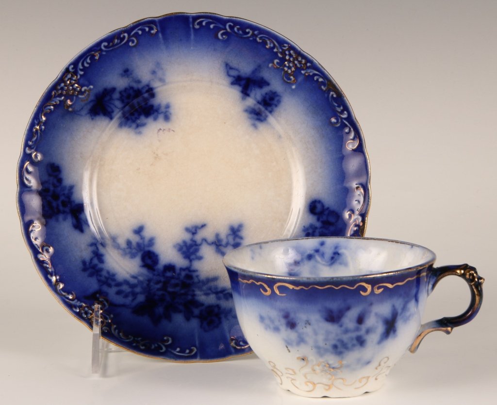 LABELLE PATTERN CUP AND PLATE: Two pieces, including one saucer that measures 7 inches in diameter, and a cup measuring 2.5 x 4.75 x 4 inches in diameter.