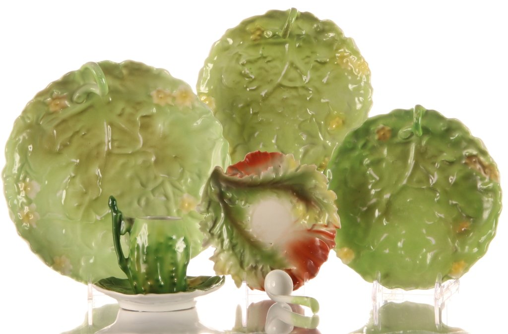 ROYAL BAYREUTH FIGURAL UNDER PLATES & MORE: Three Lettuce Leaf under plates marked with blue ink stamps, measure 5.5 and 7 inches, glaze wear on the faces. Two saucers, one with blue ink stamp #9 and the other unmarked, measure 4 and 4.25, larg