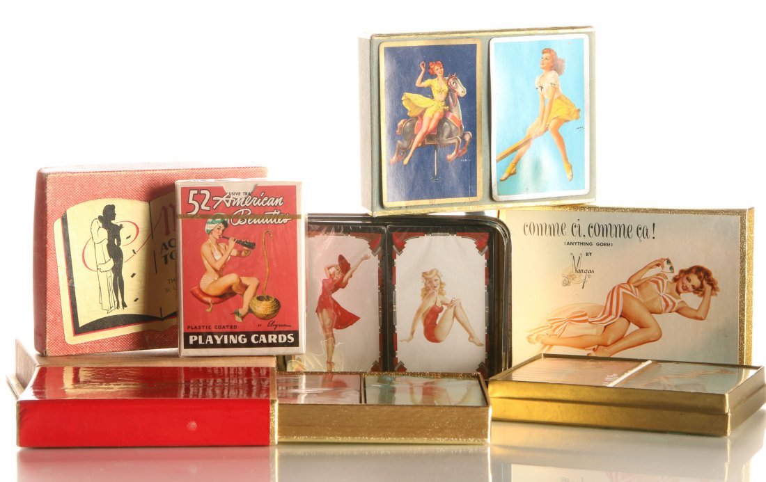 LOT OF VINTAGE PIN UP PLAYING CARDS: Featuring pin up girls by Vargas, Elvgreen, Mac Pherson, etc., unopened decks with shrink wrap, some with tax stamps.
