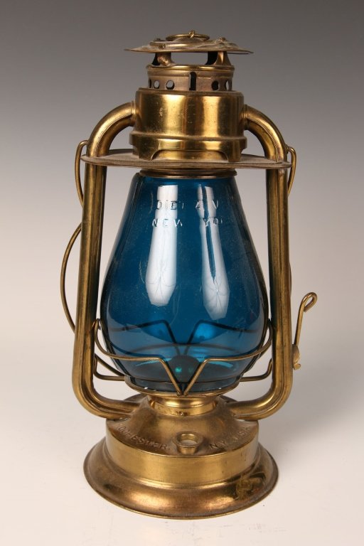HAM'S GEM. COLD BLAST BARN LANTERN WITH BLUE GLOBE: Marked to Ham's Gem., Rochester, NY, blue Dietz tall globe, stands 12 inches plus handle. Some crush to top.