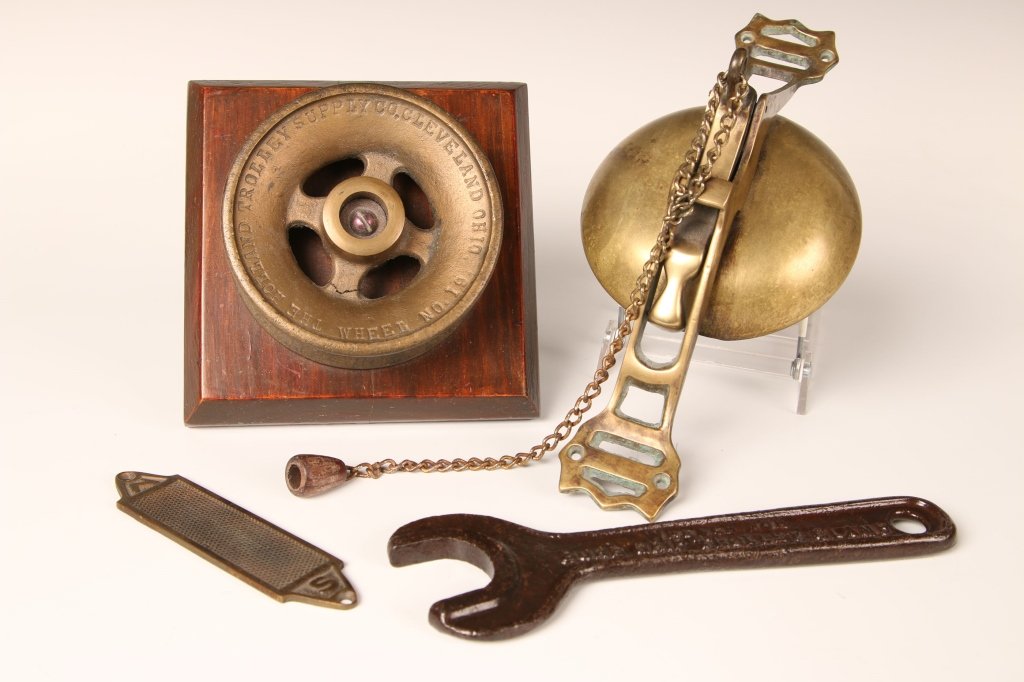 TROLLEY AND TRACTION LINE BELL, WRENCH, ETC.: Raised relief lettering to both sides, 'Electric Ry Equipment Co., Cincinnati, O.' and 'Wrench for Sue Grip Trolley Clamp.' Measures 8.5 x 3 inches. Some wear to finish, very good overall. Also a matc