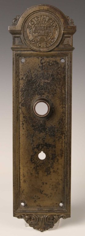 SOUTHERN PACIFIC SUNSET CENTRAL LINES RR DOOR PLATE: A brass escutcheon plate reportedly removed from the Houston & Texas Central Railroad Depot (part of the S.P. R.R.) in Austin when it was demolished in the 1920's. Raised relieve 'Yale' maker mark to 