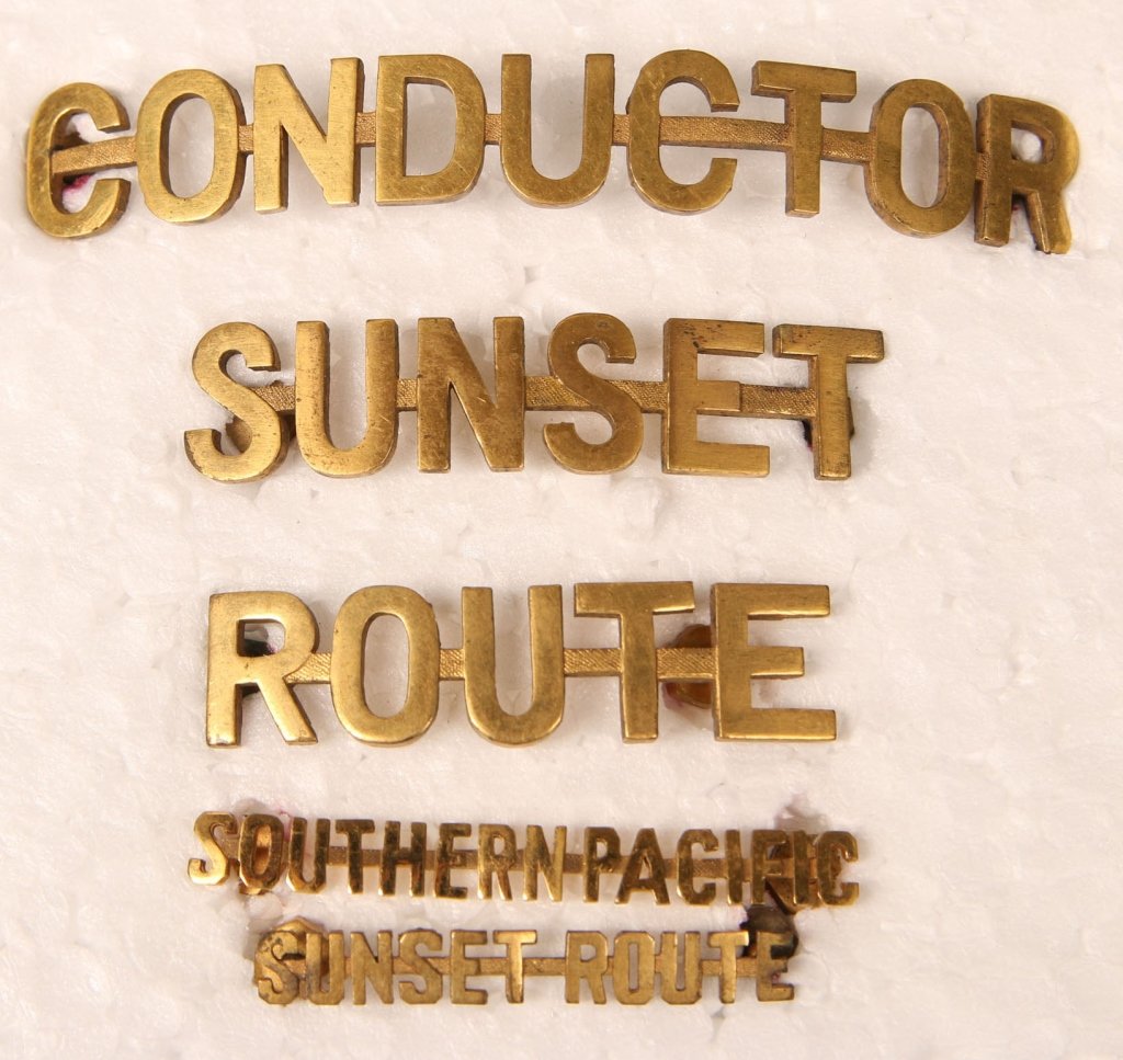 FIVE SOUTHERN PACIFIC VISOR CAP INSIGNIA TITLES: Includes a 3.5 inch CONDUCTOR, 2 inch and 2.25 inch two-piece SUNSET ROUTE, and smaller SOUTHERN PACIFIC, SUNSET ROUTE insignia. Screwbacks, very good condition.