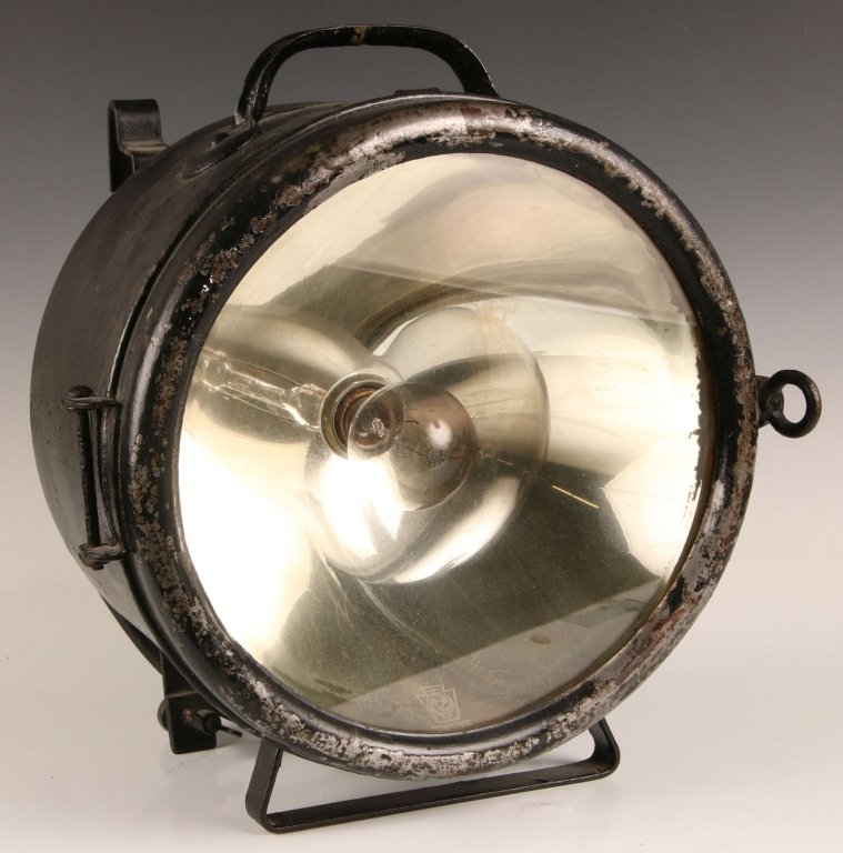 GOLDEN GLOW T-128 RAILROAD HEADLIGHT: By Electric Service Supply Co., with spec plate mounted to top near handle. Stands approximately 16 inches to top of handle, 15.5 inches wide, 11.5 inches deep. With FRY Golden Glow mark on concave mi