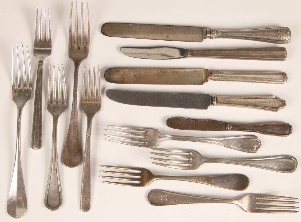 FOURTEEN RAILROAD AND HOTEL FLATWARE KNIVES AND FORKS: Nine forks, including one marked DS for Dirigible Service, plus FW&DC Ry, Hotel Central, NYC Lines, Union News, Skirvin, MTPTP RR, C&O, XV; plus five knives, Southern Ry, Nickel Plate Rd., Union Stati