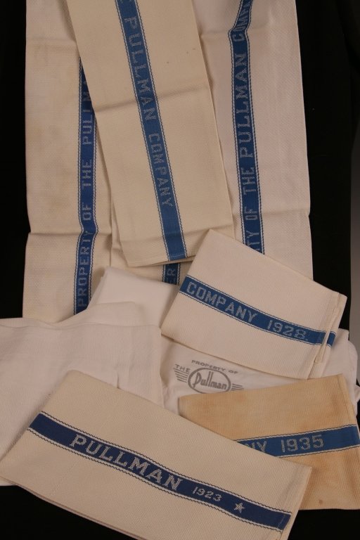 LOT OF PULLMAN RAILROAD CAR LINENS: Includes seven hand towels with blue on white logos (circa 1935), small white cloth cover; and larger white linen sheet with Pullman logos. All in good condition.