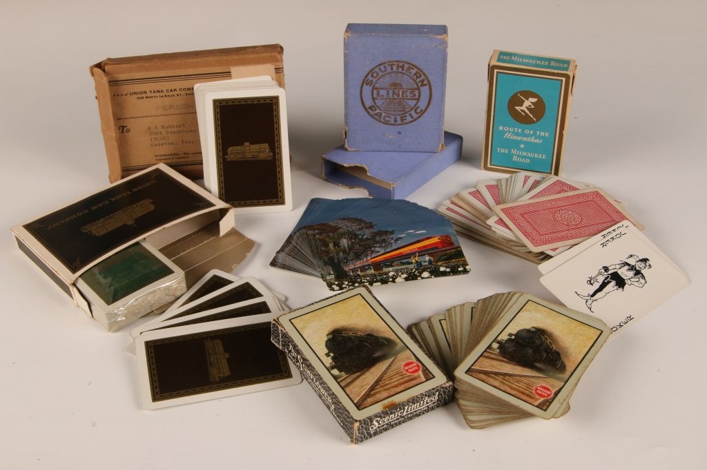 FOUR DECKS OF RAILROAD PLAYING CARDS: Missouri Pacific Lines count 52 with 1 joker, Milwaukee Road count 52 with 2 jokers, Southern Pacific Lines count 55 with 2 jokers; and a double deck from the Union Tank Car Company - two decks of 52 