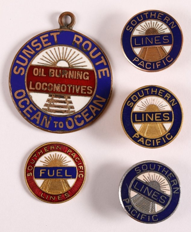 SOUTHERN PACIFIC RR 'SUNSET ROUTE' SERVICE PINS: Including a 10K gold and enameled service lapel pin, a circa 1900 enameled pendant 'Oil Burning Locomotives, Ocean to Ocean,' enameled Employee Division of Labor stickpin head - missing pin, enameled 
