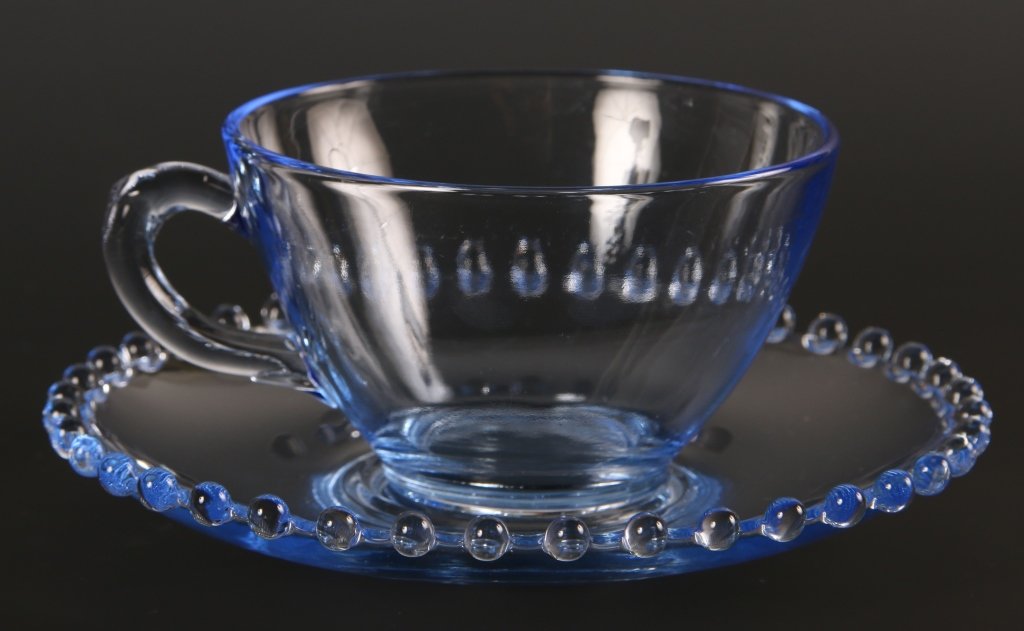 IMPERIAL CANDLEWICK VIENNESE BLUE CUP & SAUCER SET: 400/35, no bead early cup, circa 1937-1938, cup measures 2.25 inches, saucer measures 5.75 inches.