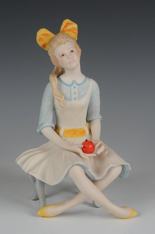 1971 CYBIS PORCELAIN 'POLYANNA' FIGURE, RETIRED: Signed and dated on the base, measures 7.5 inches.