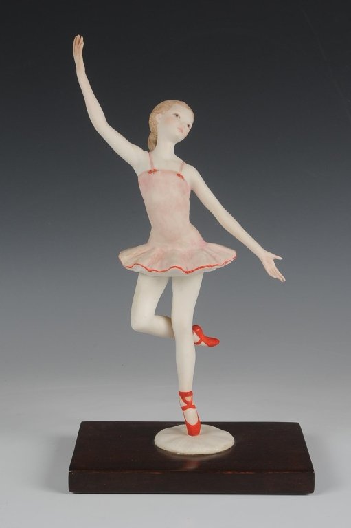 CYBIS PORCELAIN 'BALLERINA RED SHOES' FIGURE, RETIRED: Signed on the porcelain base, wooden base, measures 11.25 inches.