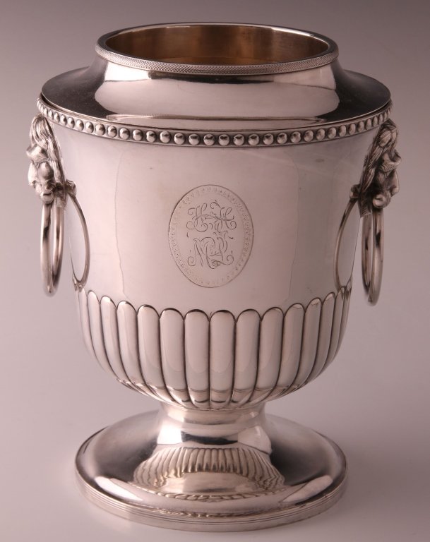 OLD SHEFFIELD PLATE REGENCY WINE COOLER: Campana form with monogrammed cartouche, lion mask handles with rings, beaded border, melon rib body, circular foot, measures 9.5 x 6.5 inches.