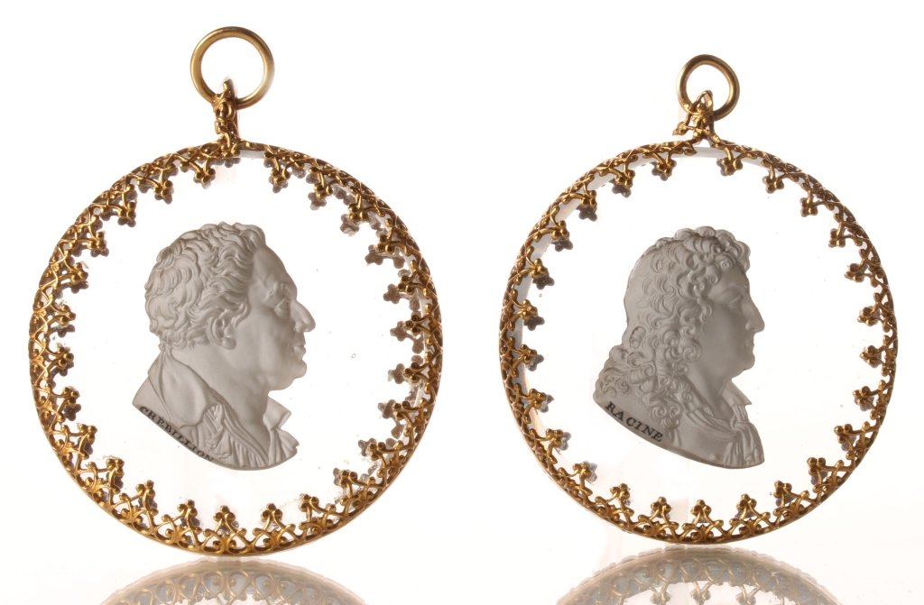 PAIR OF BACCARAT 19TH C. SULPHIDE CAMEOS: Cameos of French writers labeled 'Racine' for Jean Baptiste Racine (1639-1699) and CreBillion (sic) for Claude Prosper Jolyot de CrÃ©billon (1707-1777), gilded metal frames, measure 2.25 inches each