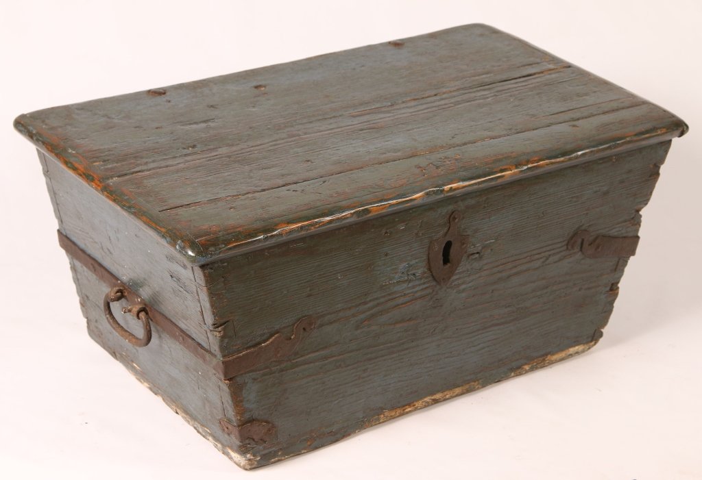 18TH C. WOOD STORAGE CHEST IN OLD BLUE PAINT: With older blue paint, bread board end top, interesting forged iron hinges and inside till. Measures 13 x 30.5 x 16.5 inches.