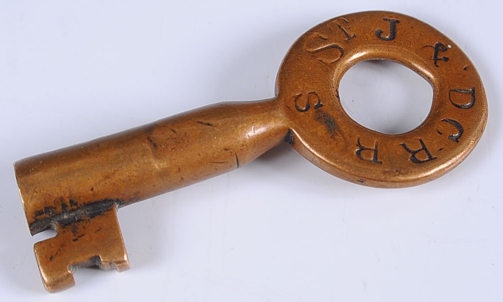 EARLY ST. JOSEPH DENVER CITY RAILROAD KEY: A scarce and early tapered barrel brass switch key for the St. Joseph and Denver City (Texas) Railroad.
