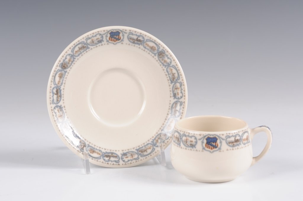 UNION PACIFIC 'HISTORICAL' PATTERN DEMITASSE CUP SAUCER: A 1.75 x 3 inch cup on 4.75 inch diameter saucer. Overland Route logo among the vignettes of American Historical subjects.