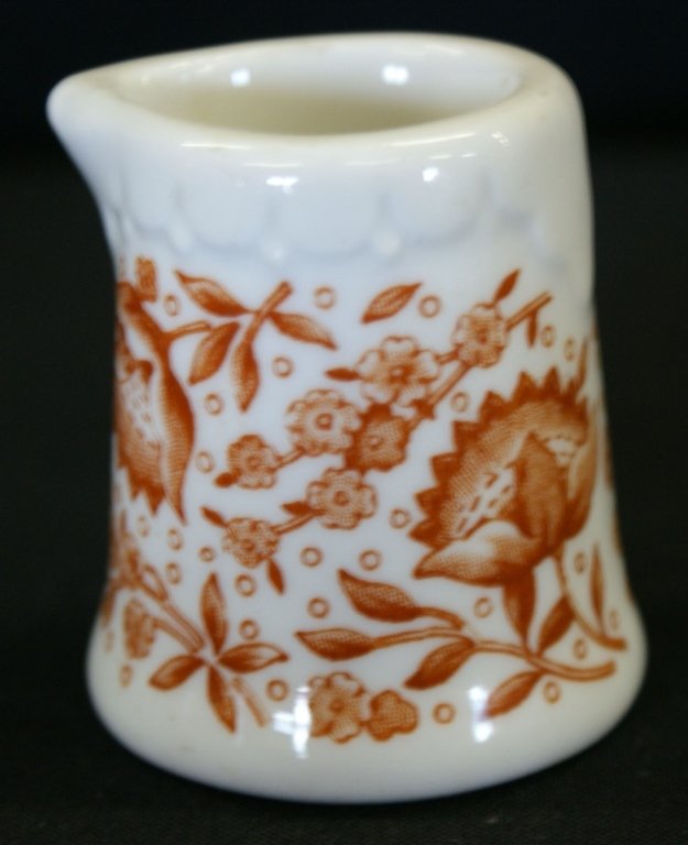 COLLECTION OF VINTAGE GLASS AND CHINA CREAMERS: Group ranging in size from 1.5 x 2 inches, up to 3.25 x 2.75 inches.